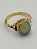 9ct gold ring set with a pale opal