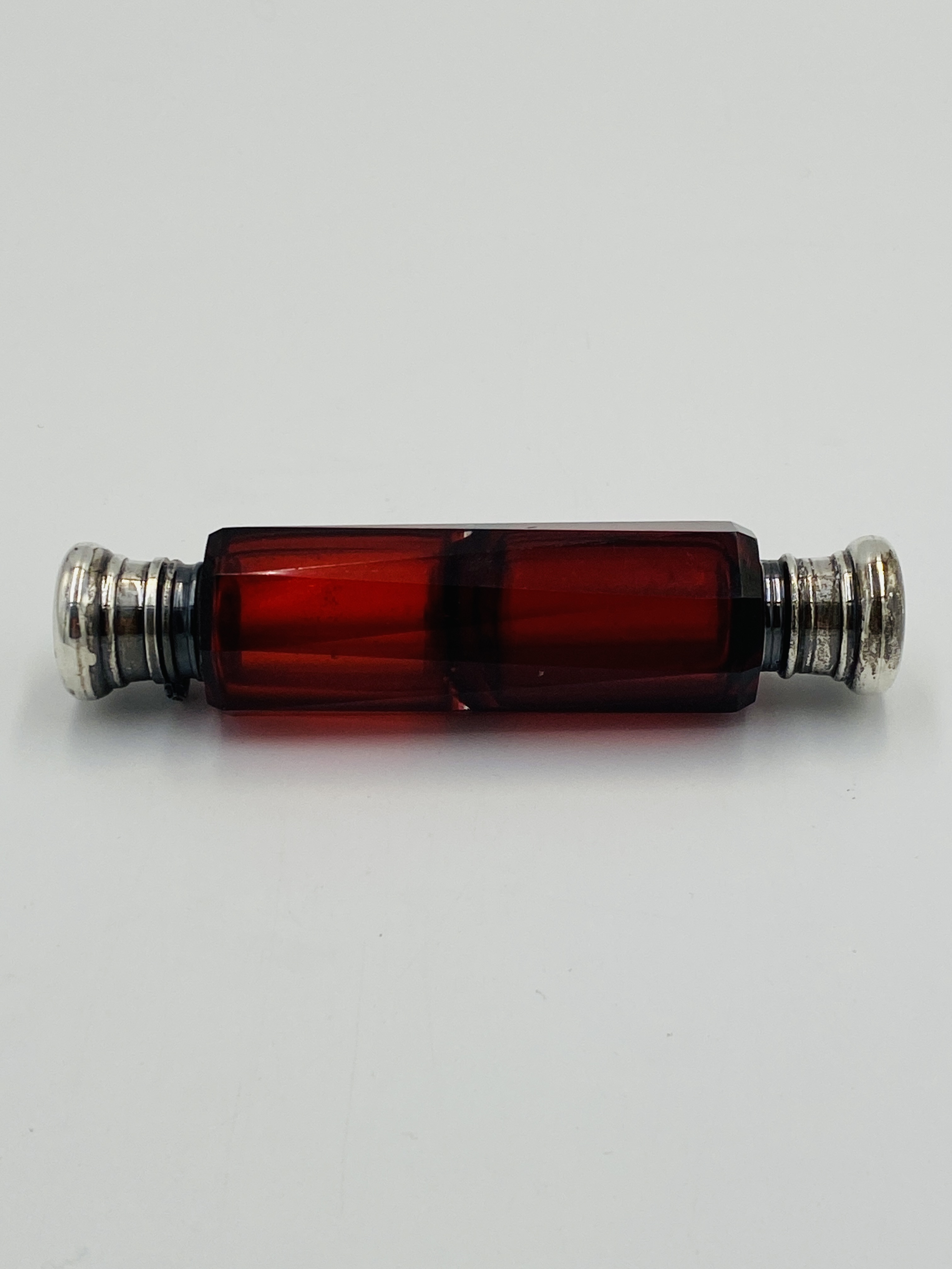 Ruby glass double ended perfume bottle with white metal tops - Image 5 of 5
