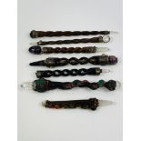 Seven crystal healing wands with semi precious stones