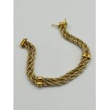 9ct gold and white metal rope twist bracelet