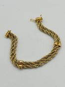 9ct gold and white metal rope twist bracelet