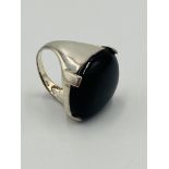 Silver ring set with an onyx stone