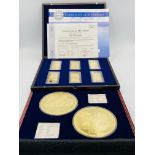 Two limited edition coin sets
