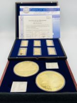 Two limited edition coin sets