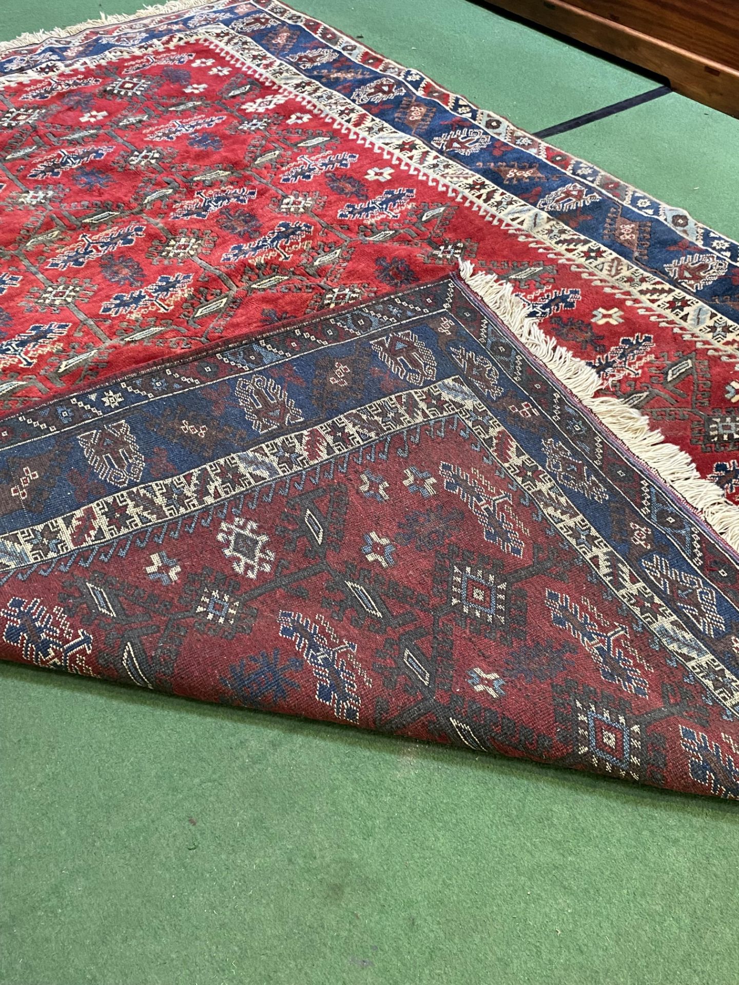 Turkish red ground wool carpet - Image 8 of 9