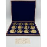 Twelve gold plated Portraits of the Queen Diamond Jubilee coins in presentation box