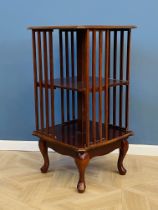 Mahogany effect revolving bookcase