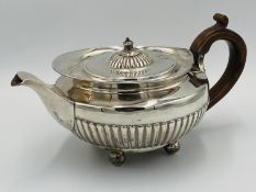 Georgian silver teapot with wood handle