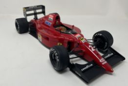 Signed 1:12th Scale Hand-Built Model of Nigel Mansell CBE's 641/2 1990 Ferrari 