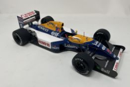 1:12th Scale Williams FW14 Model With a Plaque - Signed By Nigel Mansell CBE