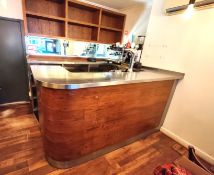 1 x Contemporary Curved Wooden Drinks Bar Featuring a Stainless Steel Bartop and Backbar