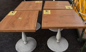 4 x Wooden Topped Bistro Tables Featuring Inlaid Brass Work And Sturdy Metal Bases