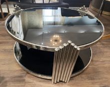 1 x Designer Opulent Black Glass Lined 2-Tier Coffee Table with a Metal Base and Pipe Decoration