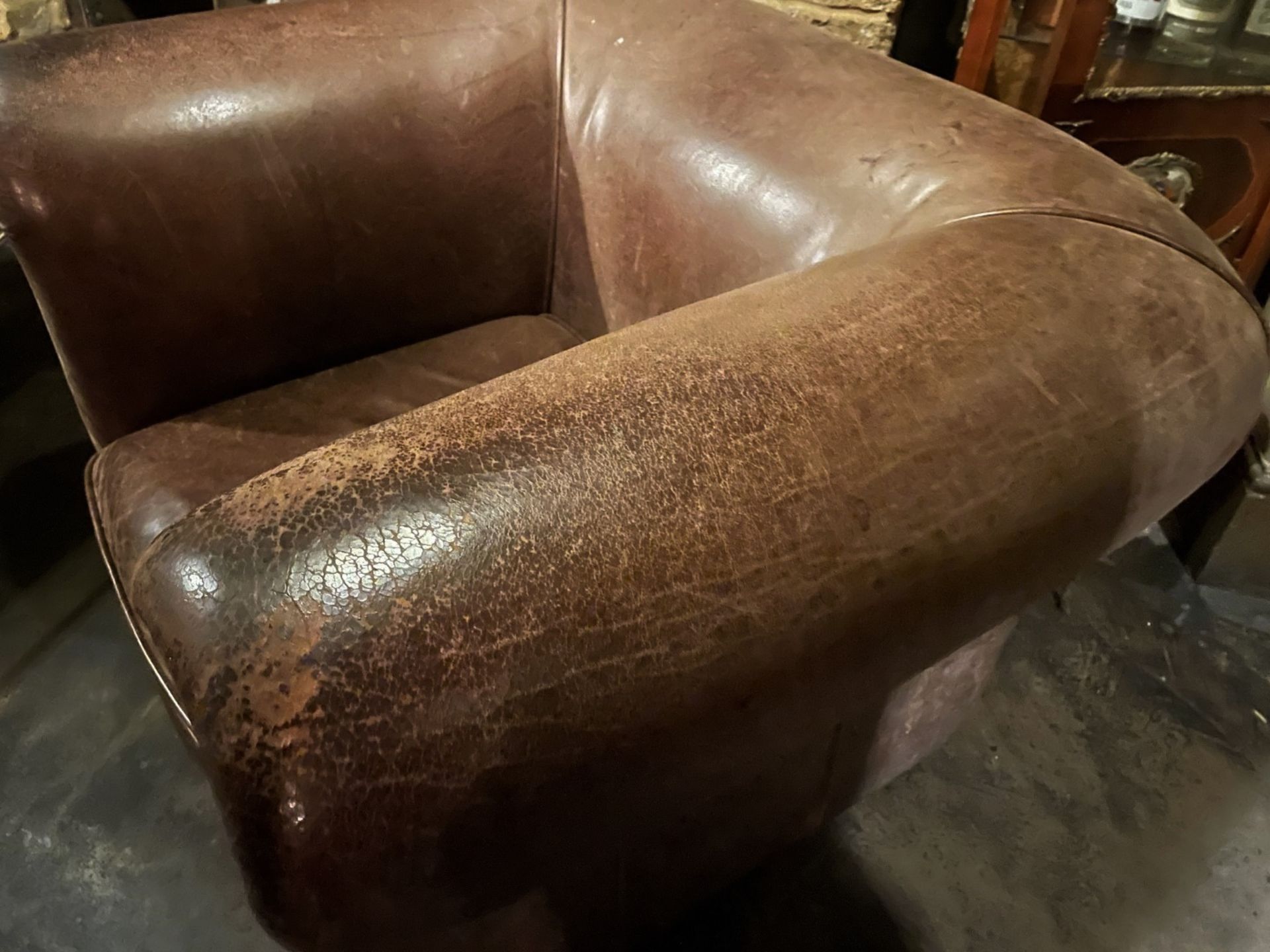 1 x Vintage Large Brown Sheepskin Leather Armchair with a Distressed Aesthetic and Studded Detailing - Image 7 of 8