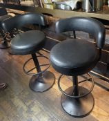 2 x Tall Rotating Bar Stools Featuring Dark Metal Bases With Footrests and Voluptuous Stitched