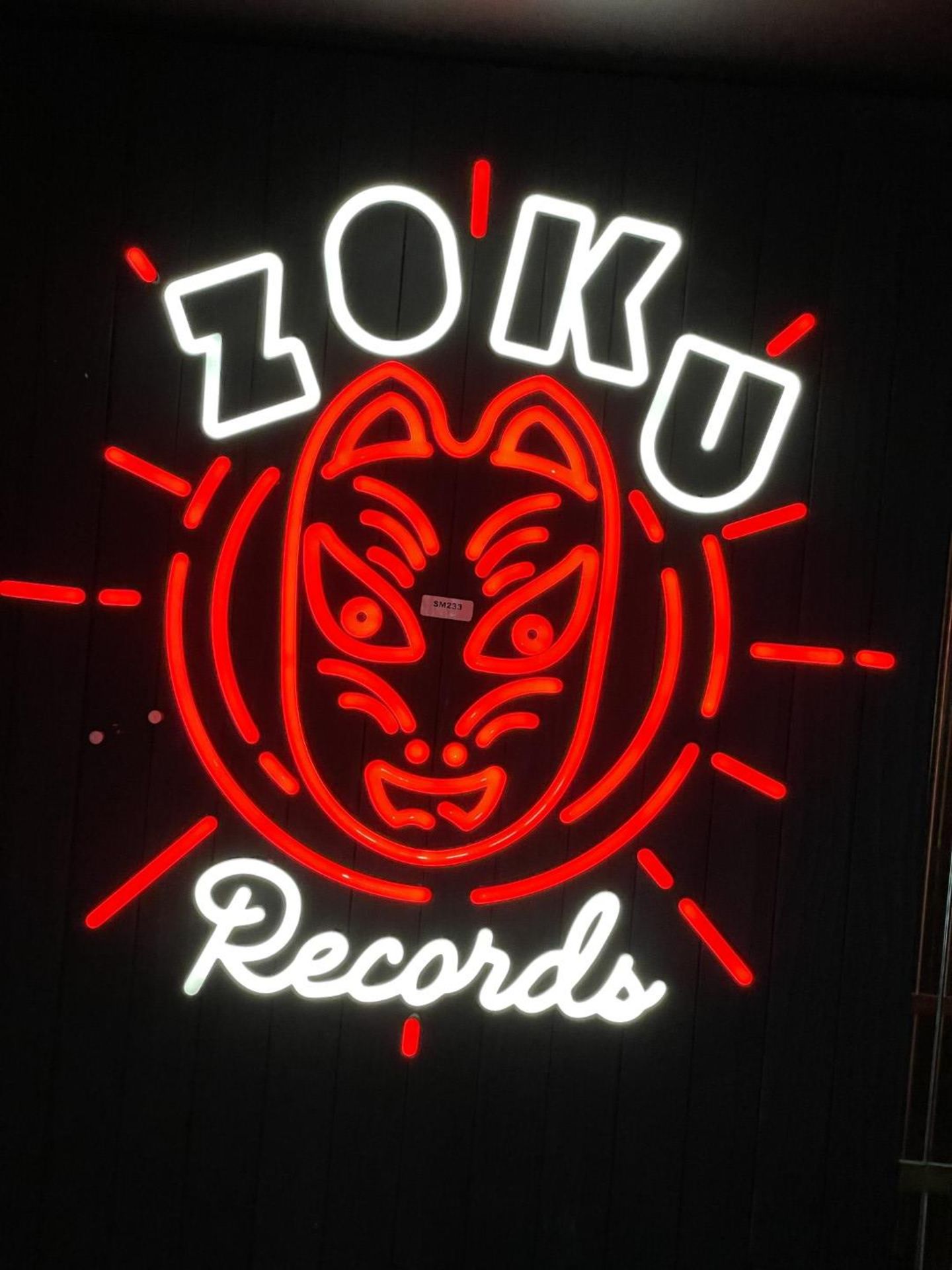1 x RED NEON Illuminated Wall Sign ZOKU RECORDS Mounted on a Black Wooden Wall Panel