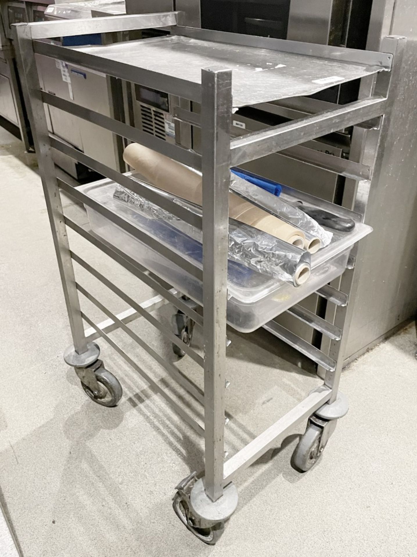 1 x Small 8 Tier Mobile Oven Tray Stand on Castors - Includes Contents