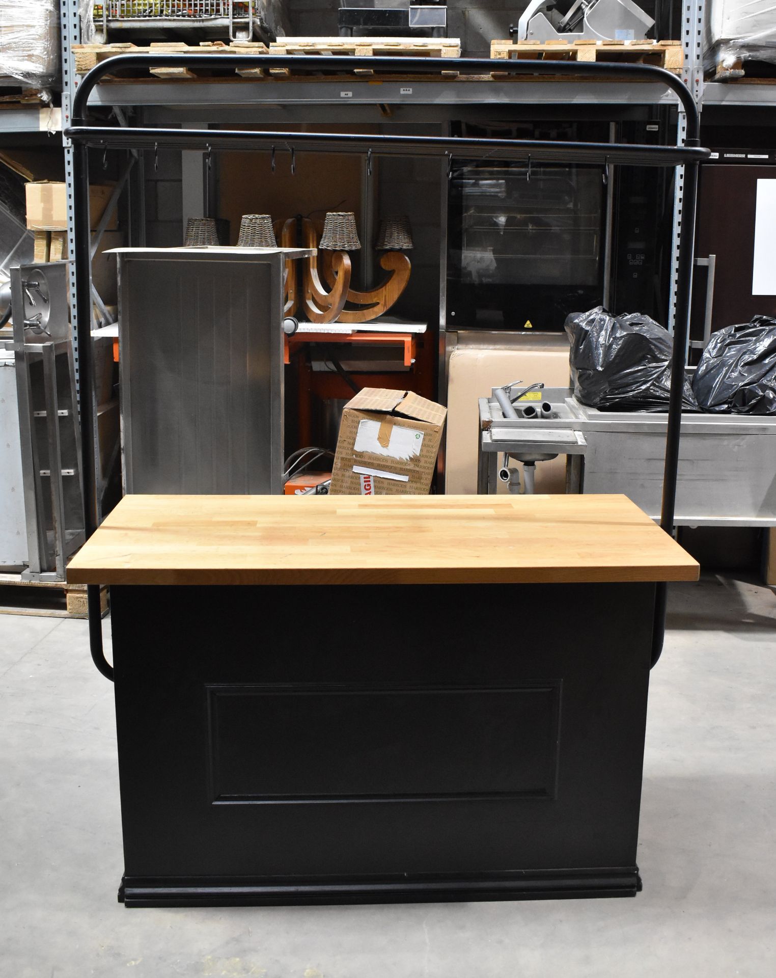 1 x Wooden Counter In Black With Wood Coloured Top and Metal Overrack Display Shelf With Hooks - 84/