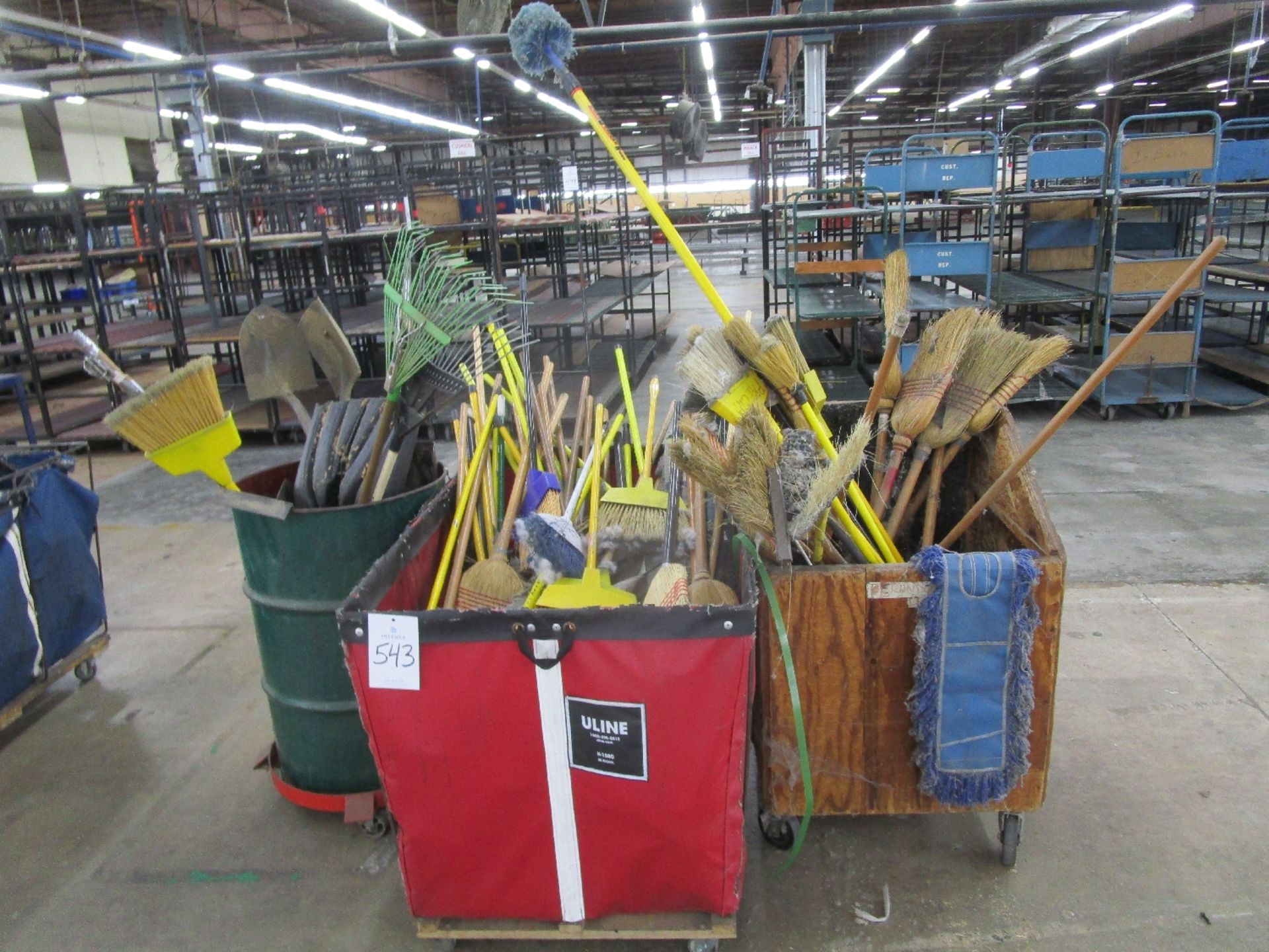 Lot of Cleaning Supplies in Uline Basket Trucks