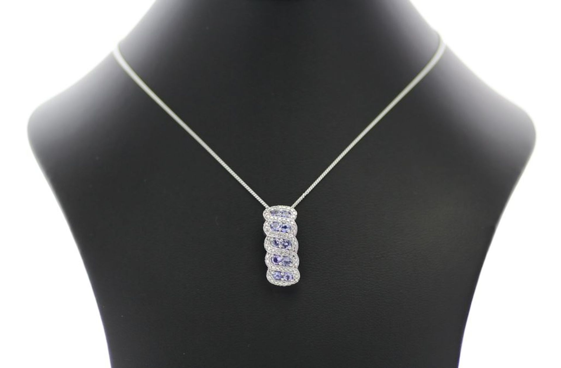 Silver Tanzanite Pendant - Valued By AGI £288.00 - Sterling silver tanzanite pendant, set with ten - Image 3 of 4