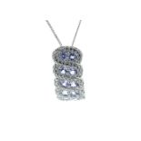 Silver Tanzanite Pendant - Valued By AGI £288.00 - Sterling silver tanzanite pendant, set with ten