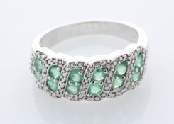 Silver Emerald Ring - Valued By AGI £290.00 - Sterling silver emerald ring , set with twelve round