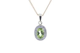 9ct Yellow Gold Diamond And Peridot Pendant (P 0.75) 0.11 Carats - Valued By IDI £1,405.00 - An oval