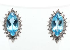 9ct White Gold Diamond And Blue Topaz Earring (BT3.73) 0.02 Carats - Valued By IDI £1,920.00 - Two