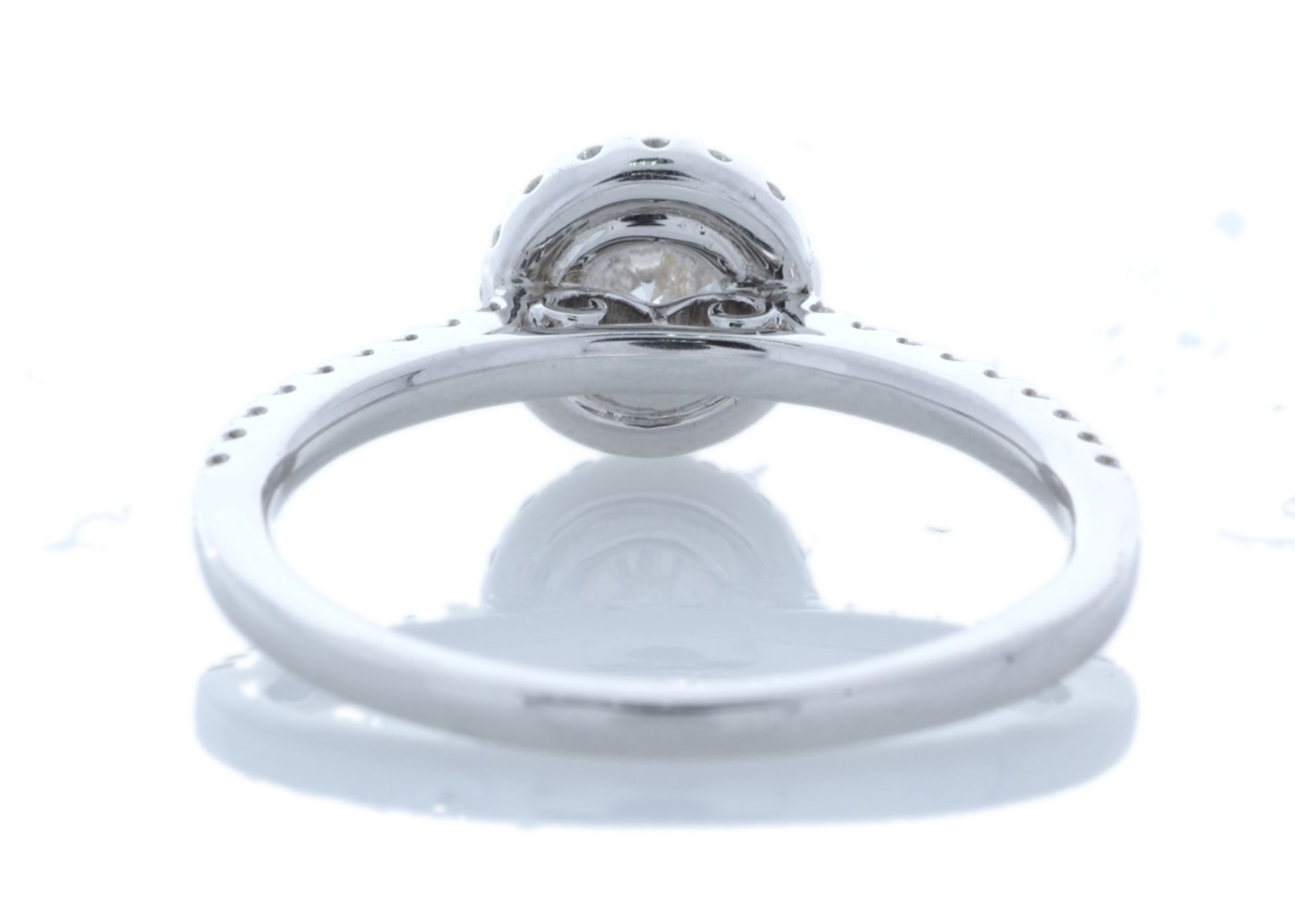 18ct White Gold Halo Set Diamond Ring 0.74 Carats - Valued By AGI £7,280.00 - One round brilliant - Image 4 of 6
