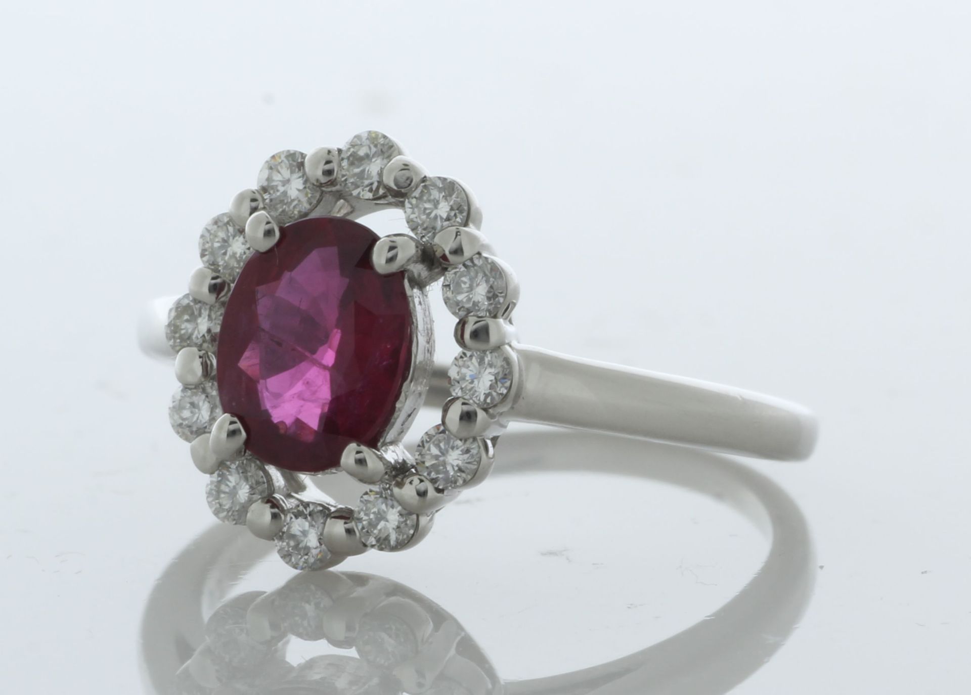 Platinum Cluster Diamond And Oval Ruby Ring (R1.03) 0.35 Carats - Valued By IDI £12,290.00 - A eye - Image 2 of 5