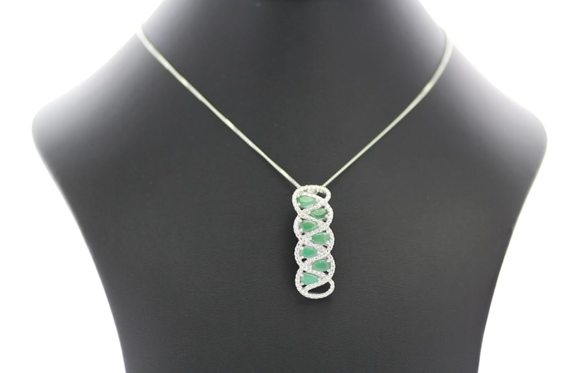 Silver Emerald Pendant - Valued By AGI £525.00 - Sterling silver emerald pendant, set with seven - Image 3 of 4