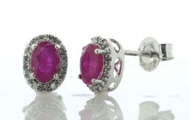 14ct White Gold Oval Cut Diamond And Ruby Stud Earring 0.10 Carats - Valued By IDI £2,650.00 - A