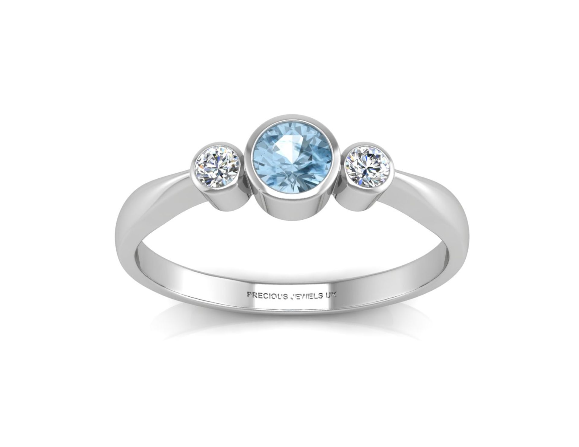 9ct White Gold Three Stone Diamond And Blue Topaz Ring (BT0.35) 0.10 Carats - Valued By AGI £2,205. - Image 3 of 5