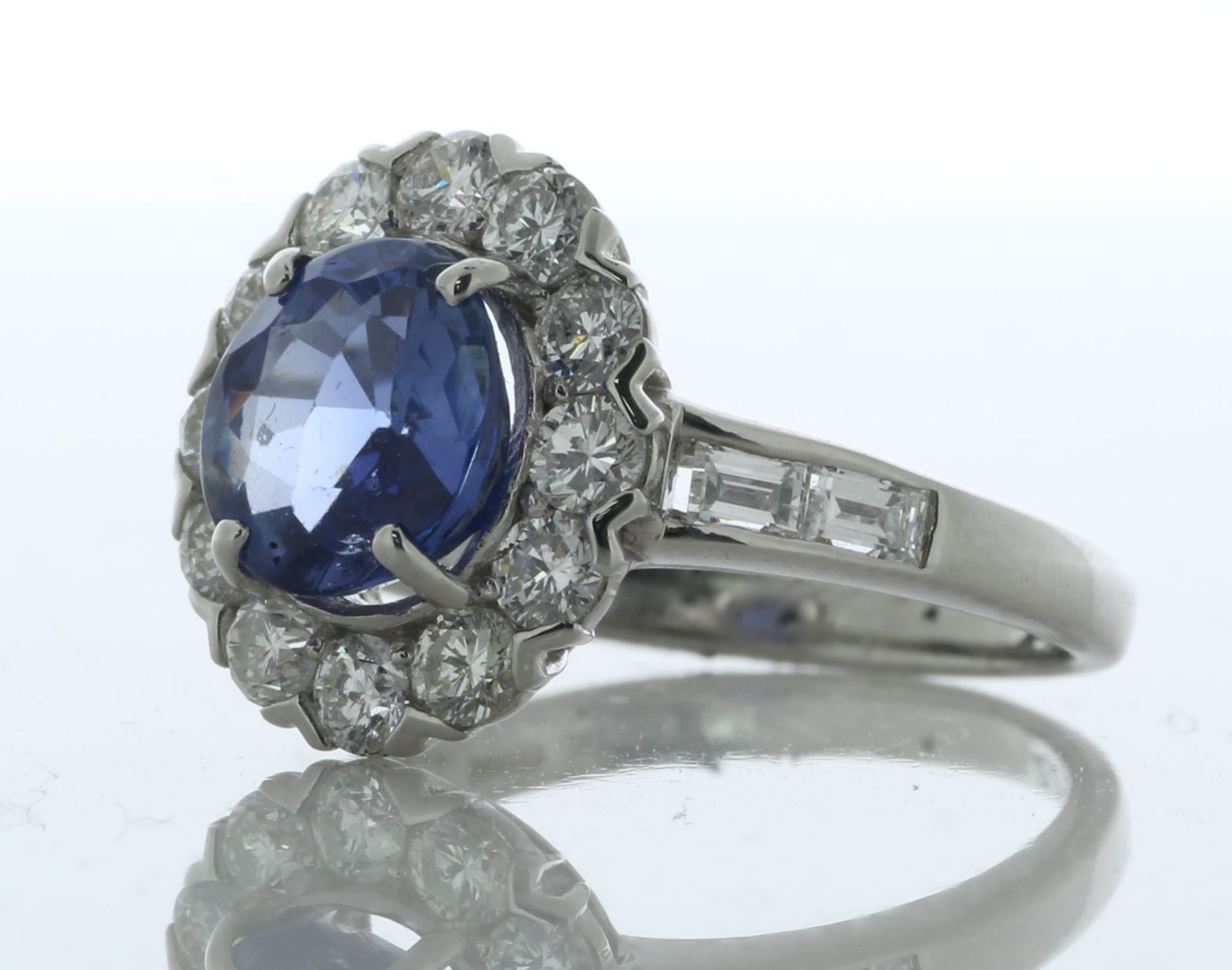 Platinum Oval Cluster Sapphire And Diamond Ring (S2.29) 1.07 Carats - Valued By IDI £28,110.00 - - Image 2 of 4