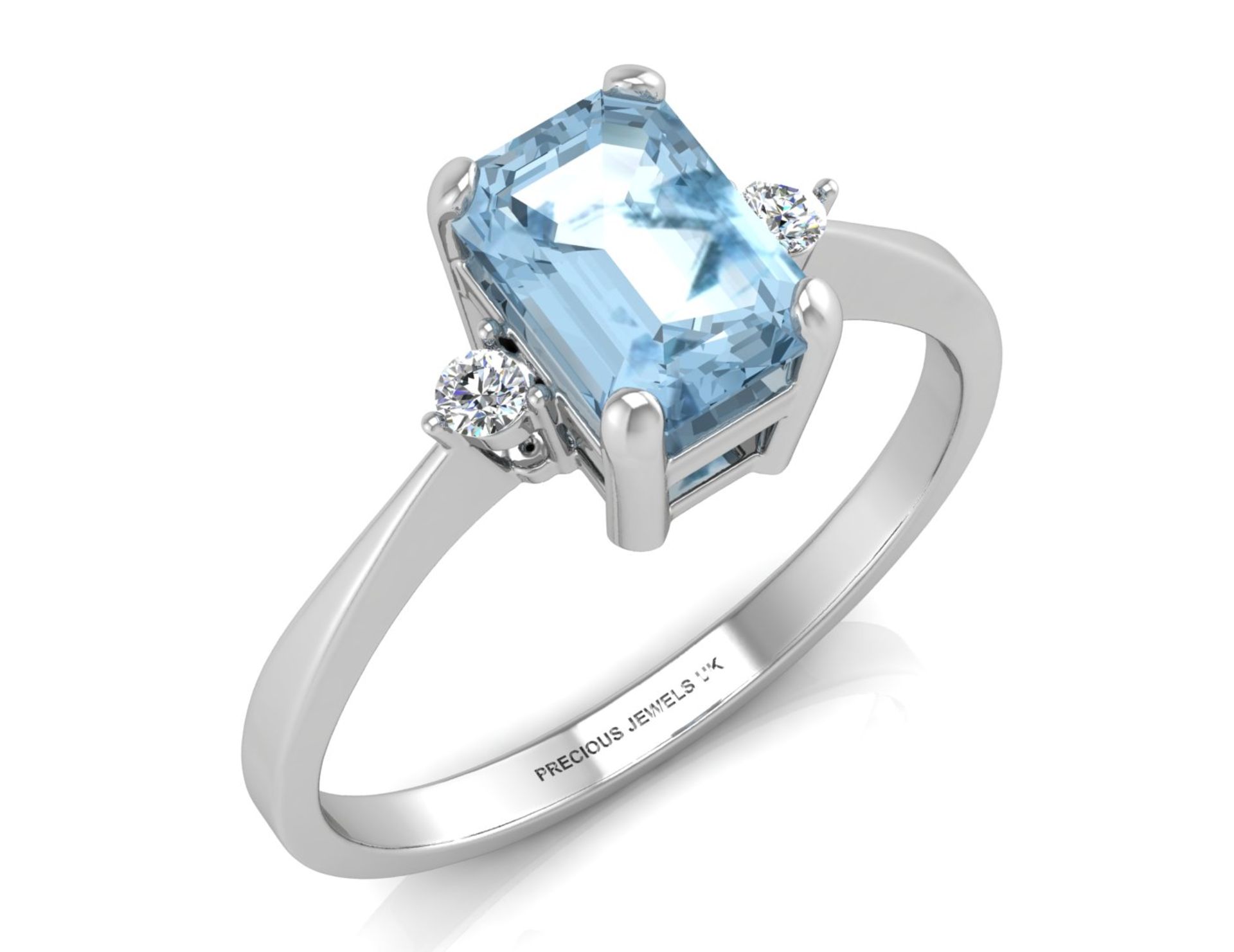 9ct White Gold Diamond And Emerald Cut Blue Topaz Ring (BT1.21) 0.04 Carats - Valued By GIE £1,495.