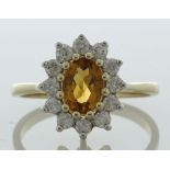 9ct Yellow Gold Oval Centre And Citrine Ring (C0.84) 0.40 Carats - Valued By IDI £3,715.00 - An oval