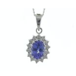 9ct White Gold Diamond And Tanzanite Pendant (T0.84) 0.14 Carats - Valued By GIE £2,380.00 - An oval