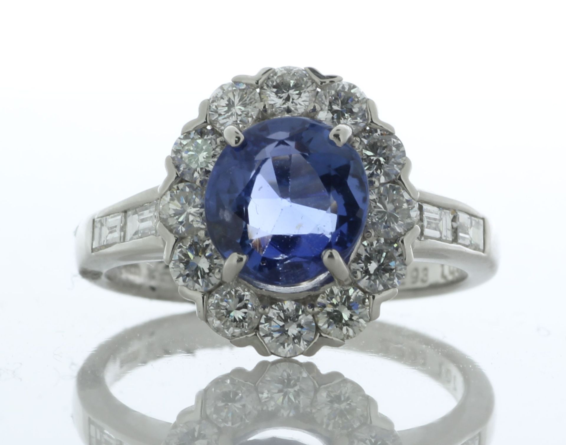 Platinum Oval Cluster Sapphire And Diamond Ring (S2.29) 1.07 Carats - Valued By IDI £28,110.00 -