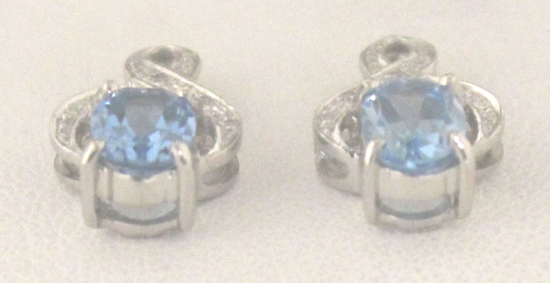 9ct White Gold Diamond And Blue Topaz Earrings - Valued By GIE £950.00 - A beautiful oval shaped - Image 2 of 4