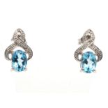 9ct White Gold Diamond And Blue Topaz Earrings - Valued By GIE £950.00 - A beautiful oval shaped