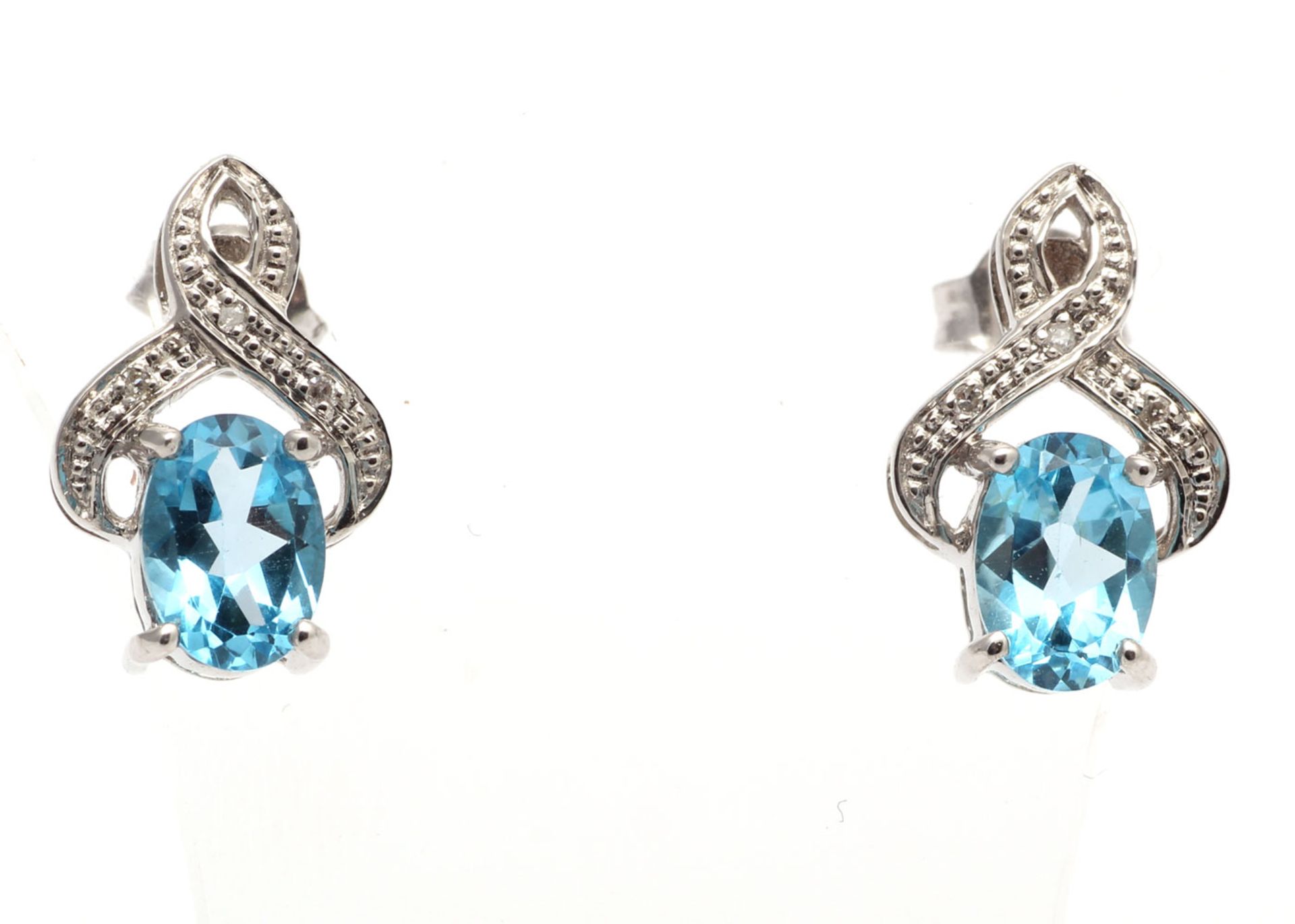 9ct White Gold Diamond And Blue Topaz Earrings - Valued By GIE £950.00 - A beautiful oval shaped