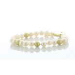 Freshwater Cultured 5.5 - 6.0mm Pearl Bracelet With Gold Plated Silver Clasp And Fastening -