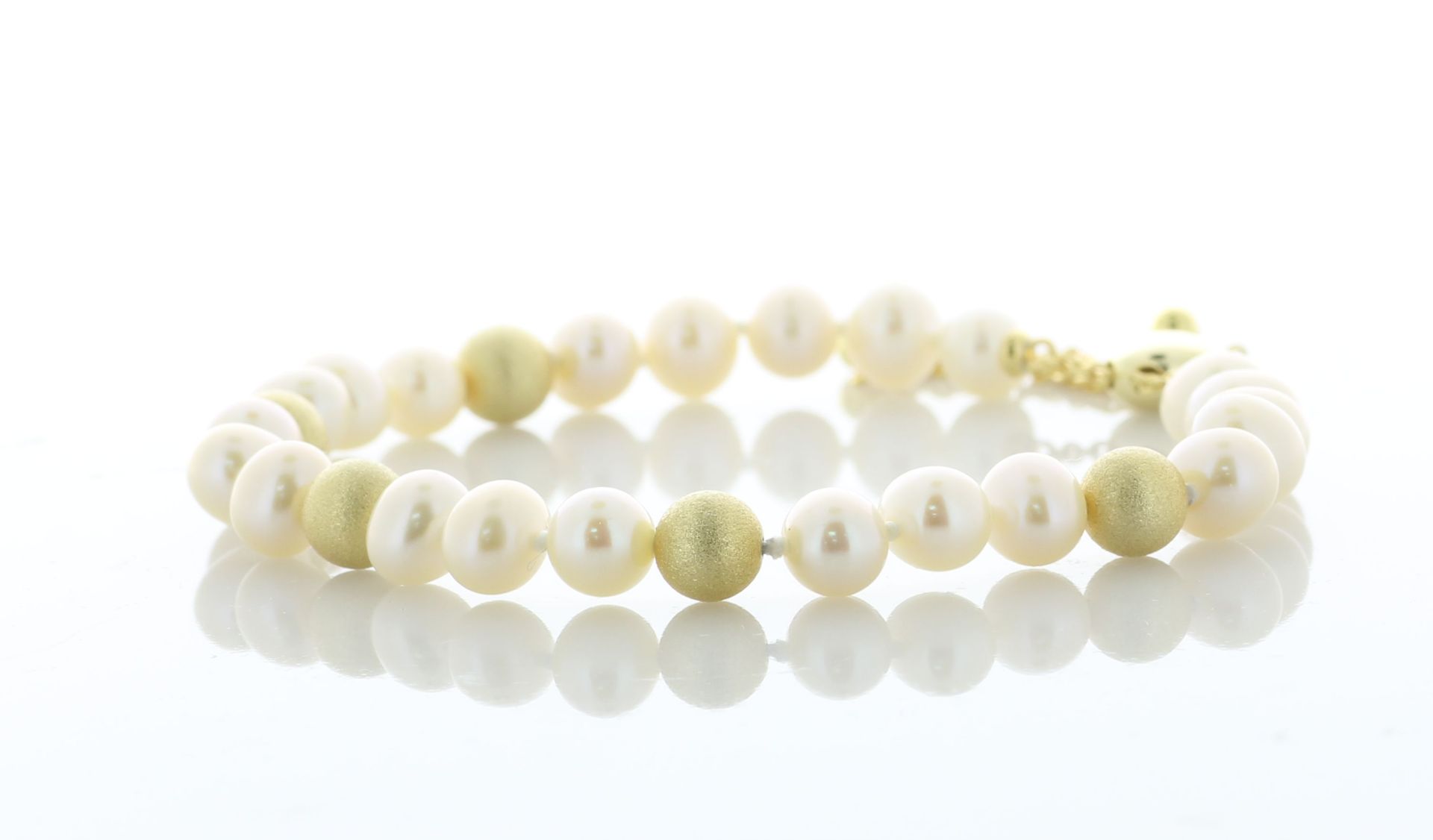 Freshwater Cultured 5.5 - 6.0mm Pearl Bracelet With Gold Plated Silver Clasp And Fastening -