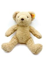 A modern Steiff blonde bear, 'My First Steiff' embroidered to foot, button and label to ear. In good