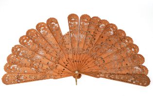 An early Victorian Chinese carved wooden fan One stave broken, some of the steel mirrors missing