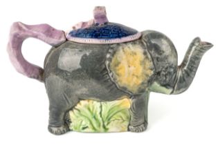 A 19th century majolica tea pot in form of an elephant, approx 22cm long, 14cm high Chip to the