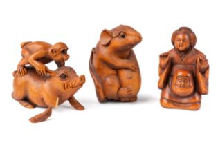 Three Japanese carved netsuke - geisha, rat and a monkey riding a pig, 2 with signatures at base
