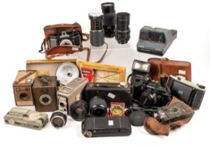 A collection of cameras and lenses, including Kenilworth box camera; Kodak Brownie Flash IV; Coro-