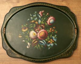 Large green Tole ware tray painted with flowers. Approx. 68 cm x 54 cm. Some wear and marks to the