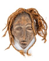African tribal mask with braided raffia "hair" , 34 cm long Signs of use and age